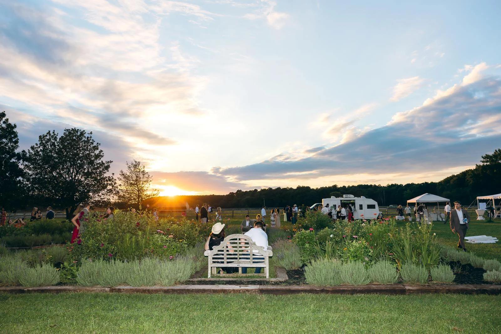 Sunset over the gardens and lawn at Marble Head Farm